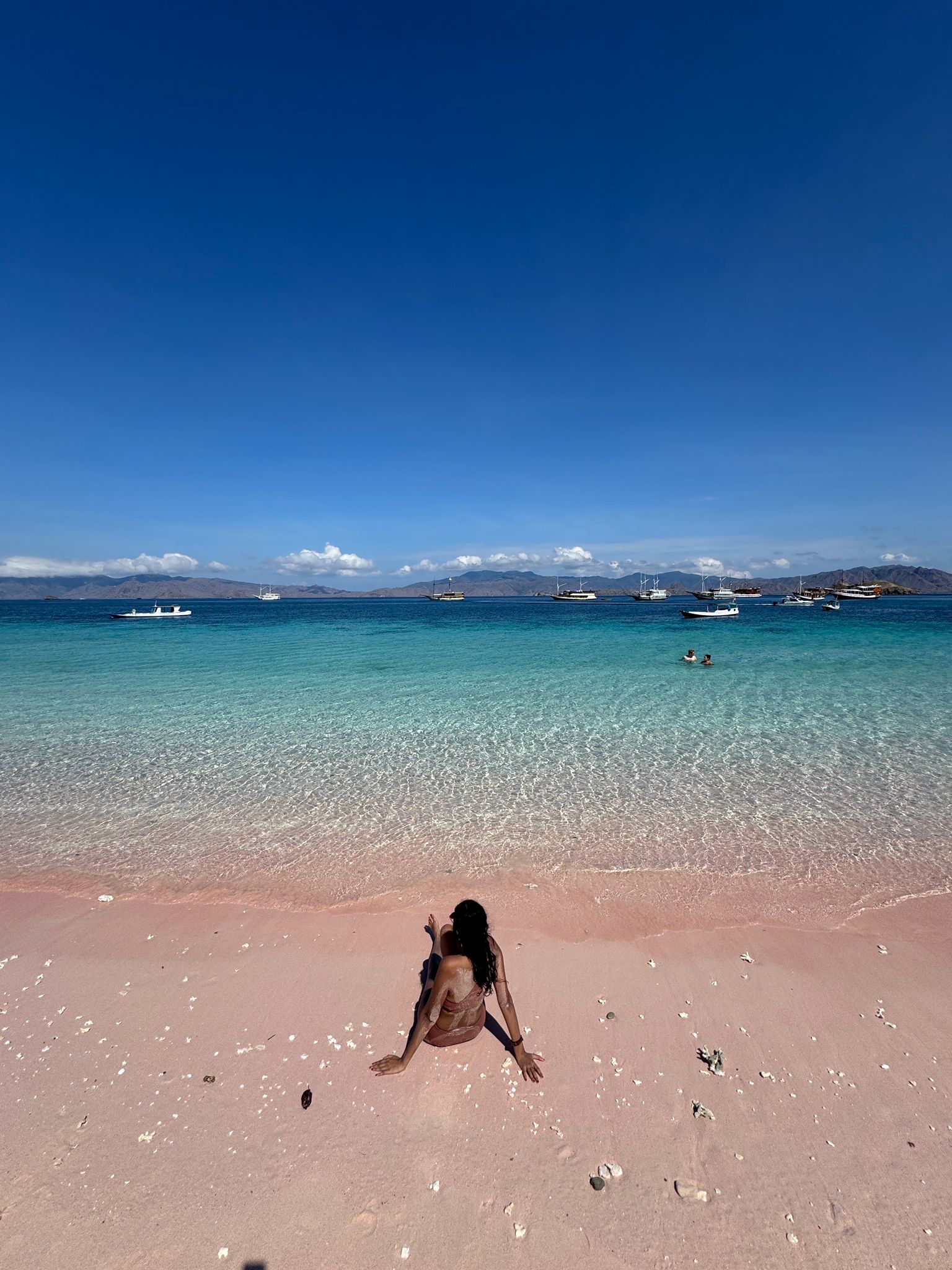 relaxing at pink beach in komodo island